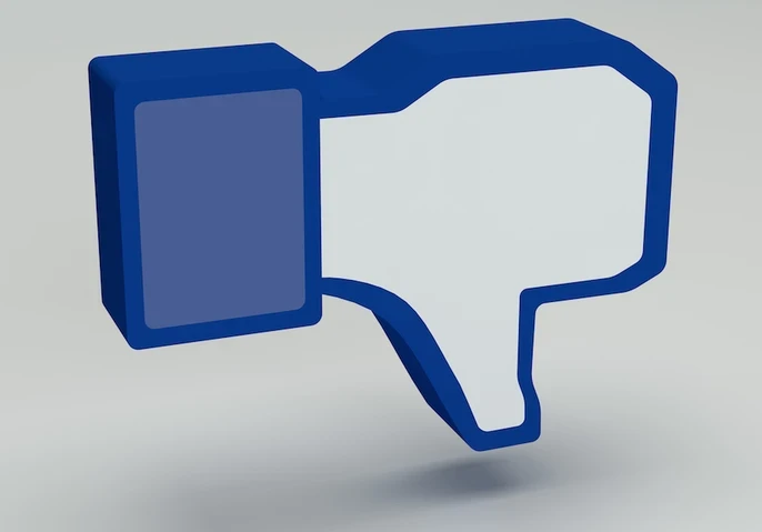 Reaction emoji showing a thumbs down in Meta's Facebook branding