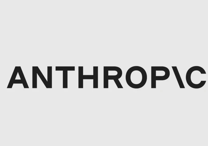 Anthropic logo displayed on a screen alongside AI-themed graphics, illustrating the company's proposed IPO and growing role in the enterprise AI market.