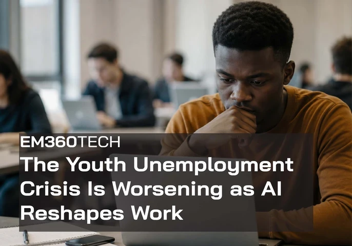EM360Tech news graphic showing a young man looking thoughtfully at a laptop in a shared workspace, with other people working on laptops in the blurred background. Text reads: “The Youth Unemployment Crisis Is Worsening as AI Reshapes Work.” 