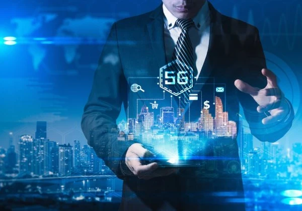 Hologram of London cityscape with 5G beamed in the sky