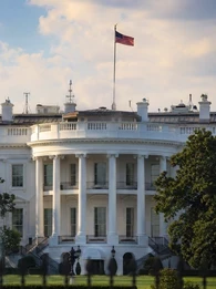 Photo of white house from front lawn