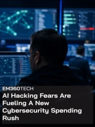 A cybersecurity operations centre with analysts working at computer monitors displaying code, network maps and security dashboards. A dark overlay reads: “EM360TECH AI Hacking Fears Are Fueling A New Cybersecurity Spending Rush.”