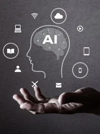 A hand with palm outstretched with a sketch of a head with a brain that reads AI, surrounded by digital symbols, including WiFi, tablets, email, laptops, showing skills required to use AI