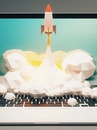 A rocket launching from a laptop