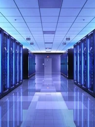 Image showing a large warehouse with servers behind glass doors