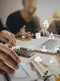 Workers working on laptops in an office