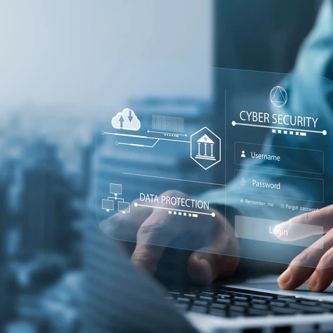 Woman typing on a laptop 