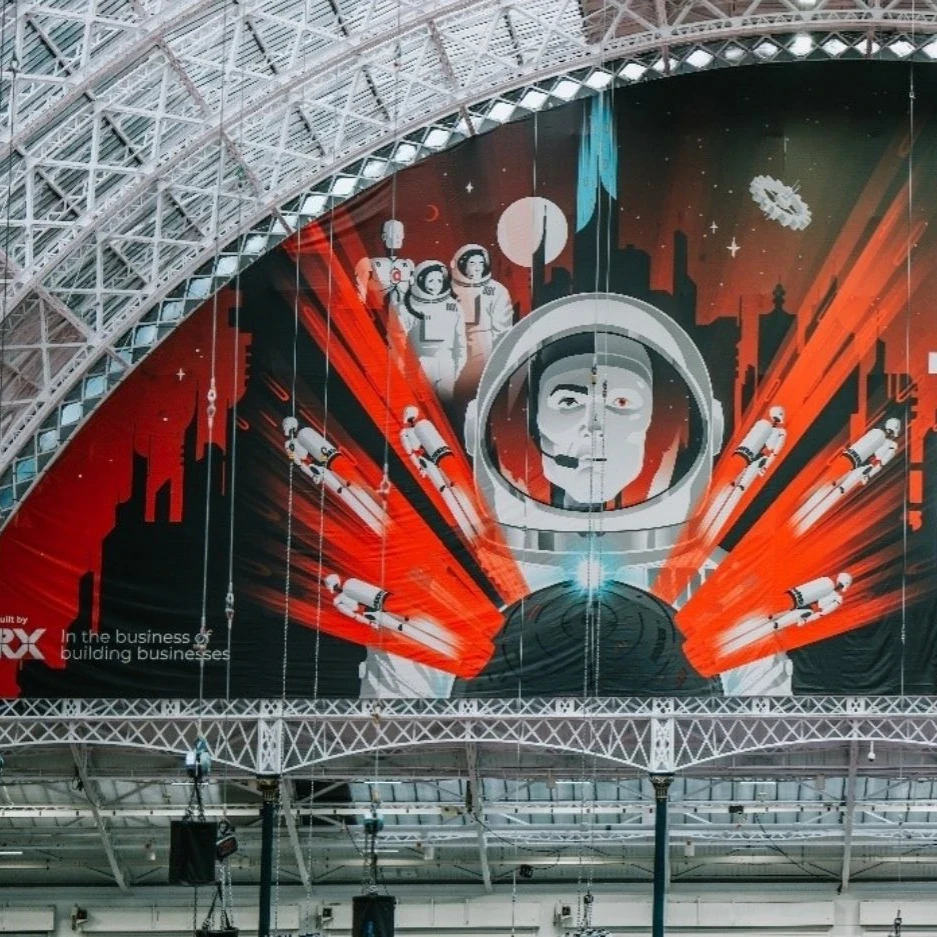 Wide interior view of Olympia London beneath its white arched glass roof, featuring a huge red, black and white Big Data LDN banner with an astronaut graphic and the text “BIG DATA LDN! THE FUTURE IS INSIGHT”, alongside the 18–19 September 2024 event dates and sponsor logos.