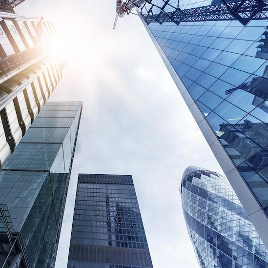 Photo taken from City of London showing various London skyscrapers including the Gherkin
