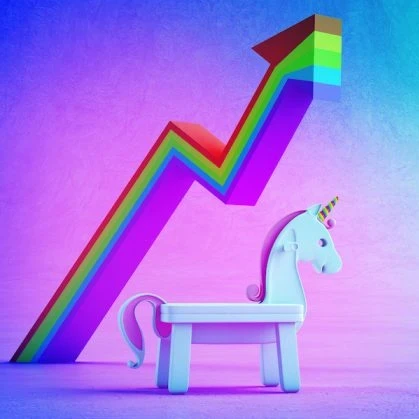 Unicorn in front of a rainbow graph showing a dramatic upward trajectory